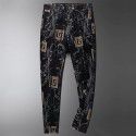 Autumn and winter new fashion brand corduroy printed trousers men's striped fashionable casual pants men's slim feet 