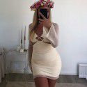Sexy and fashionable hollowed out mesh revealing backpack hip skirt dress